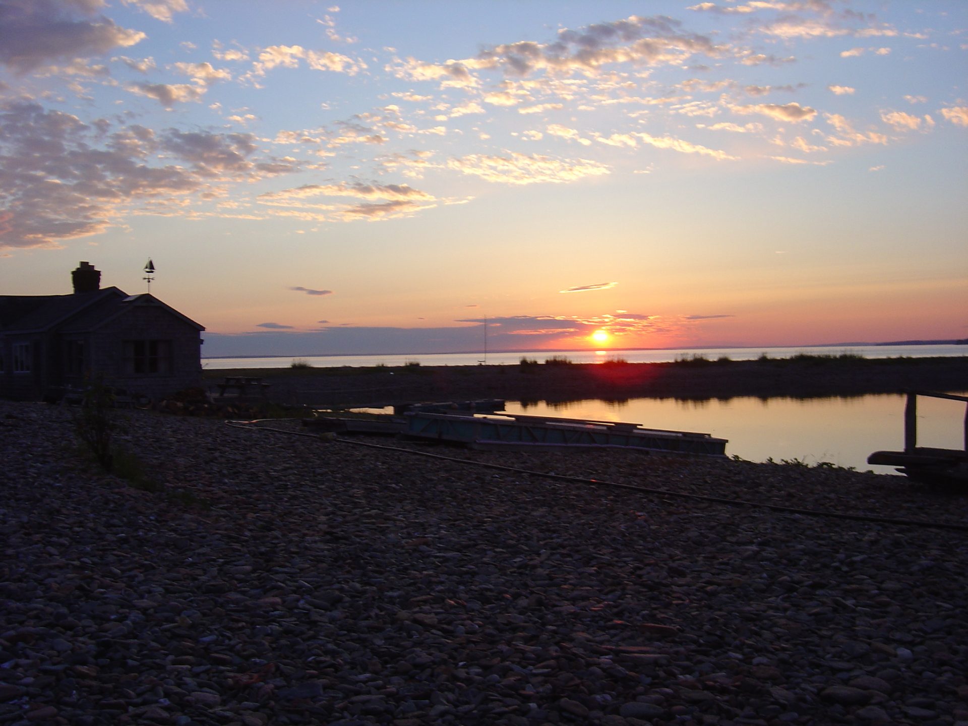 a sunset over a body of water