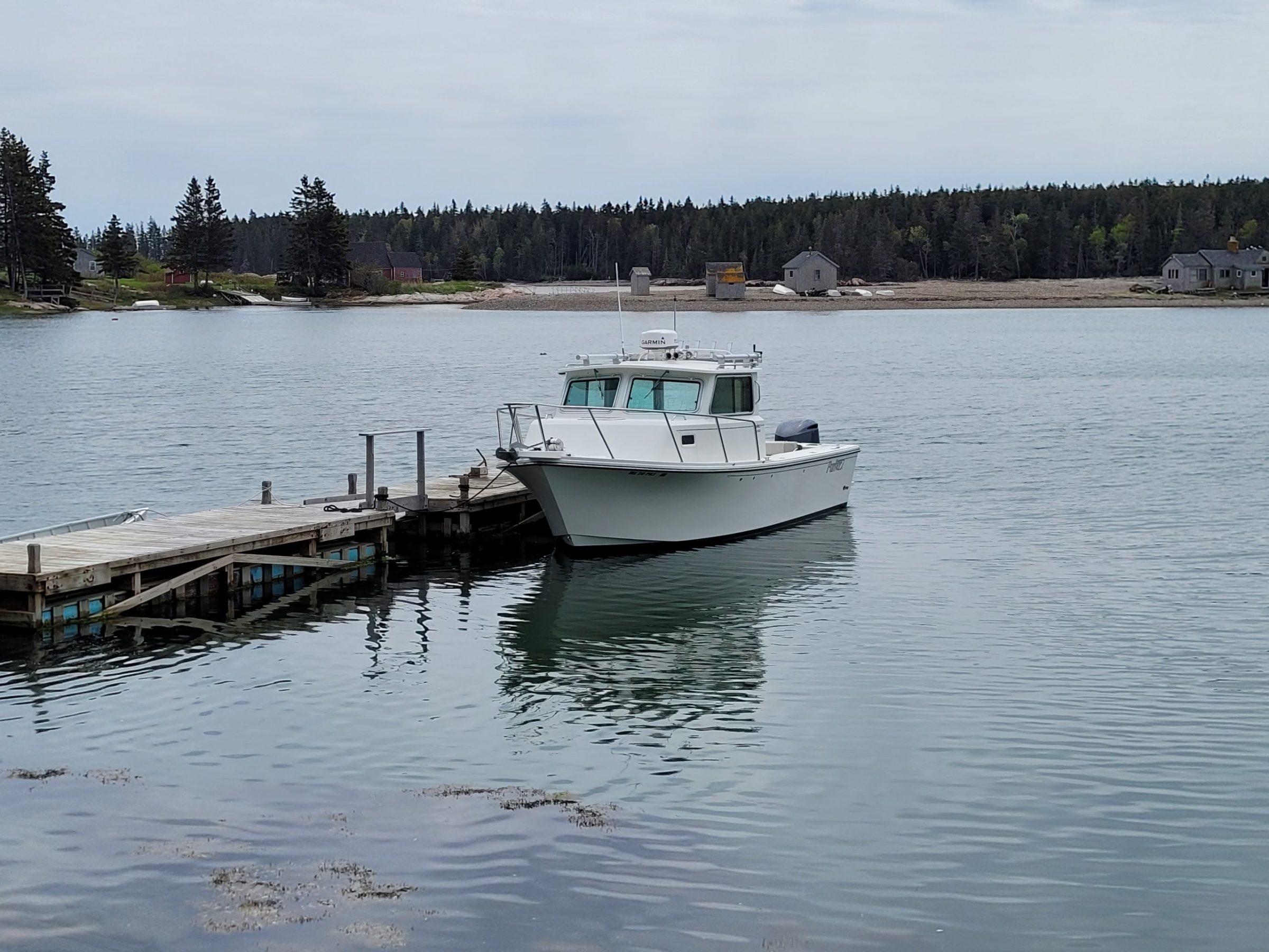 a boat is docked Great Gott Island Maine