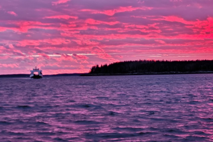 a sunset over a body of water