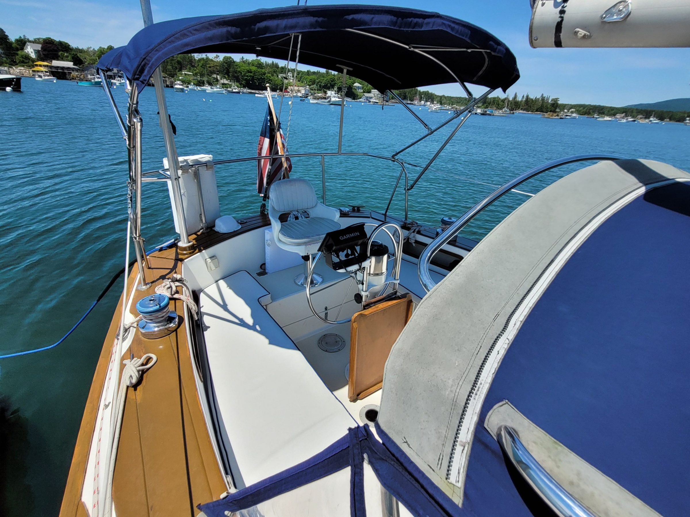 a boat sitting next to a body of water