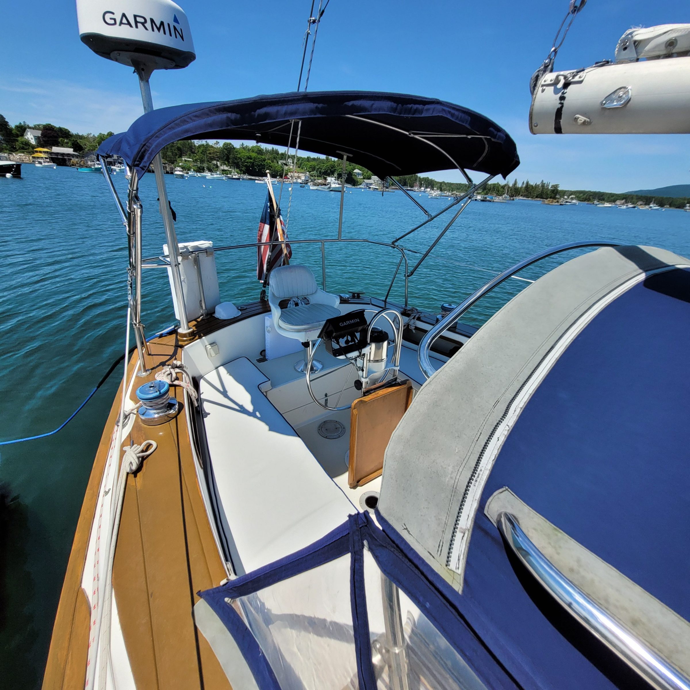 a boat sitting next to a body of water