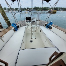 a boat is docked next to a body of water